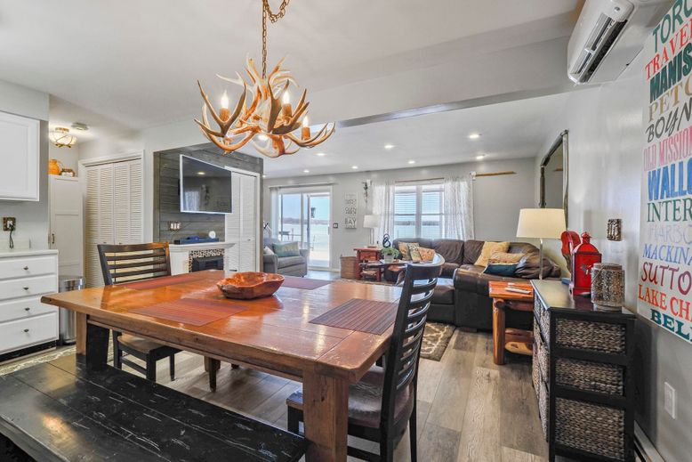 Chandelier, Dining room, Fireplace, Interior, Living room, Recessed Lighting, Wood Texture Flooring