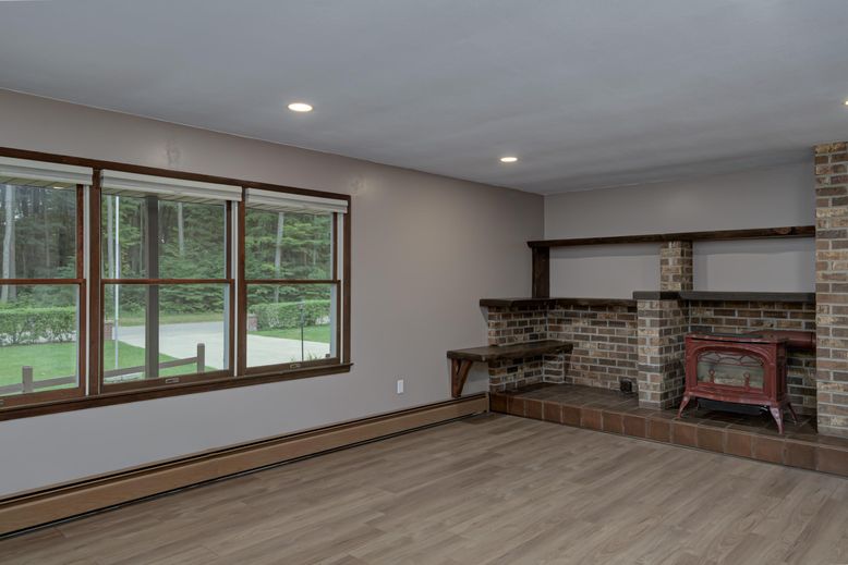 Fireplace, Interior, Recessed Lighting, Stone Walls, Wood Texture Flooring