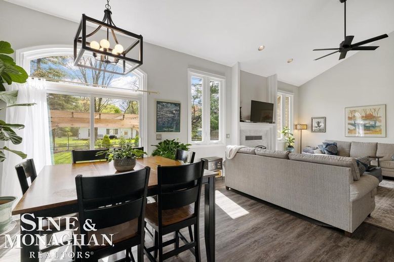 Chandelier, Dining room, Fireplace, Interior, Living room, Pendant Lights, Recessed Lighting, Wood Texture Flooring