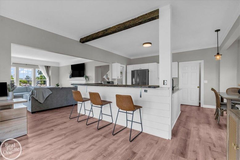 Dining room, Interior, Kitchen, Living room, Pendant Lights, Stainless Steel Appliances, Wooden Beams, Wood Texture Flooring