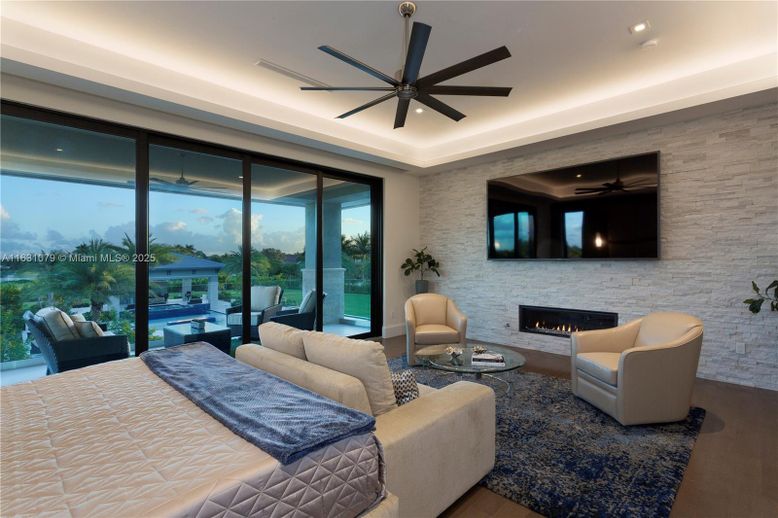 Fireplace, Interior, Living room, Recessed Lighting, Stone Walls, Wood Texture Flooring