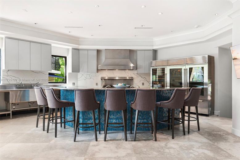 Interior, Kitchen, Marble Walls, Recessed Lighting, Stainless Steel Appliances