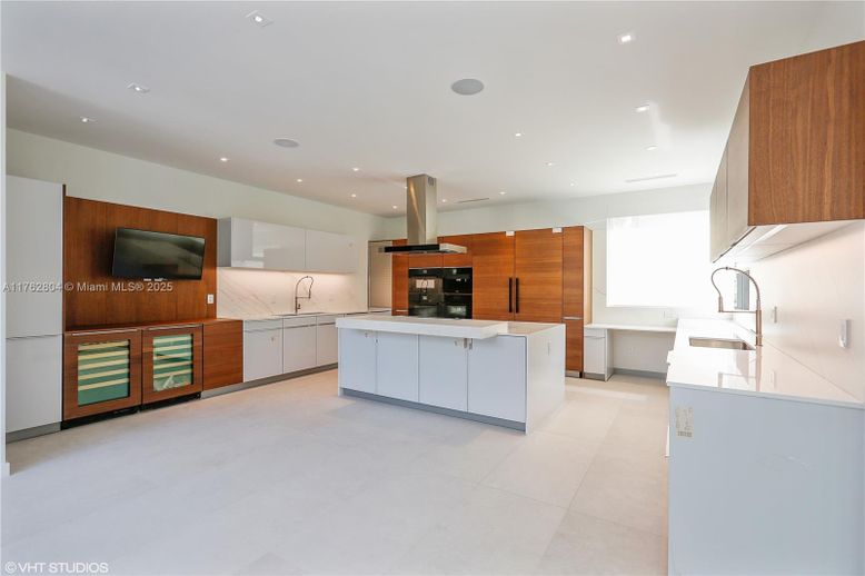 Interior, Kitchen, Marble Walls, Recessed Lighting, Stainless Steel Appliances