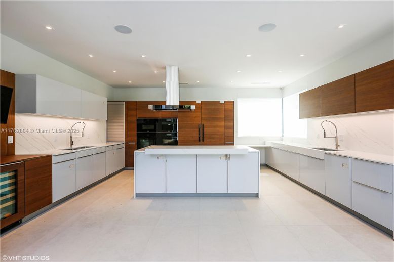 Interior, Kitchen, Marble Walls, Recessed Lighting, Stainless Steel Appliances