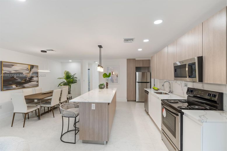 Dining room, Interior, Kitchen, Marble, Pendant Lights, Recessed Lighting, Stainless Steel Appliances
