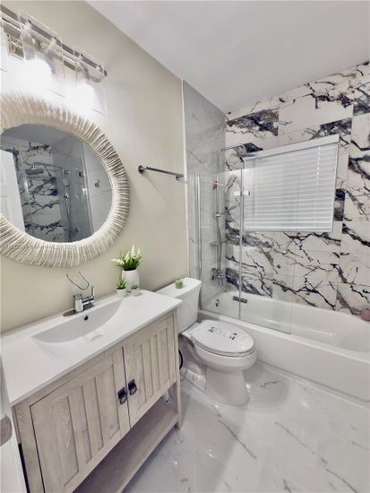 Bathroom, Dual Sink Vanities, Glass Shower, Interior, Marble, Marble Walls