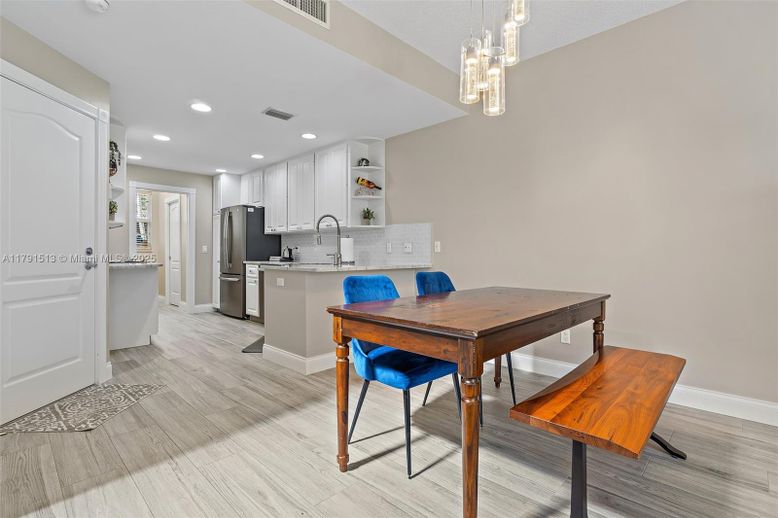 Dining room, Interior, Kitchen, Pendant Lights, Recessed Lighting, Stainless Steel Appliances, Wood Texture Flooring