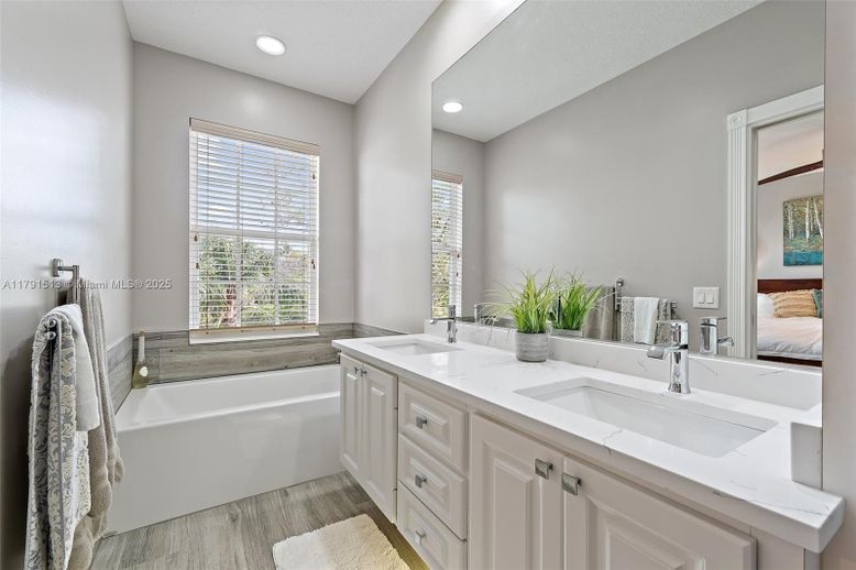 Bathroom, Dual Sink Vanities, Interior, Recessed Lighting, Wood Texture Flooring