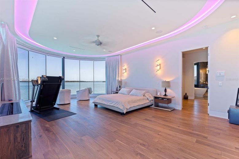 Bedroom, Fitness Equipment, Interior, Recessed Lighting, Water, Wood Texture Flooring