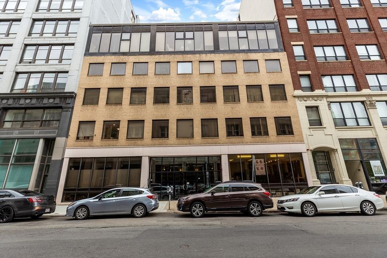 Exterior, Facade, Brick Facade, Condo Building