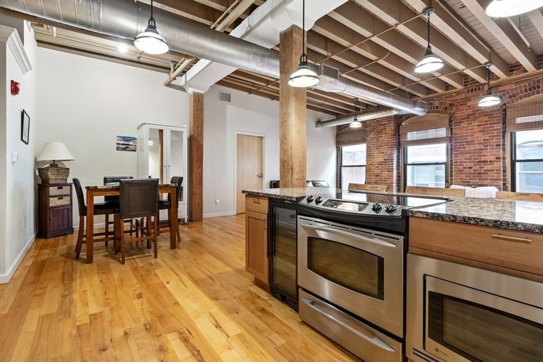 Dining room, Interior, Kitchen, Pendant Lights, Stainless Steel Appliances, Stone Walls, Wooden Beams, Wood Texture Flooring