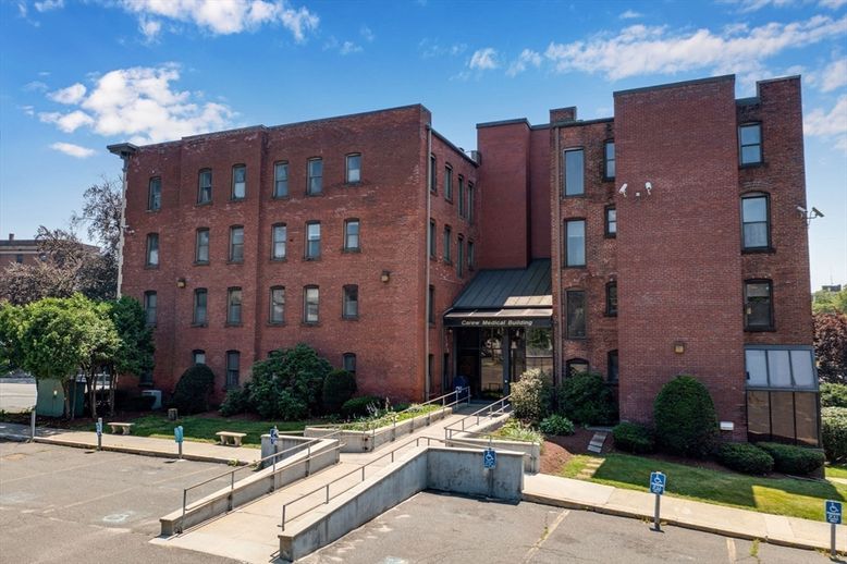 Exterior, Facade, Brick Facade, Condo Building