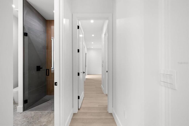 Bathroom, Glass Shower, Interior, Recessed Lighting, Wood Texture Flooring