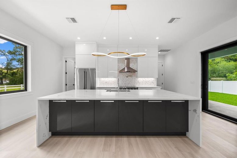 Interior, Kitchen, Pendant Lights, Recessed Lighting, Stainless Steel Appliances, Wood Texture Flooring