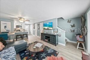 Fireplace, Interior, Kitchen, Living room, Stainless Steel Appliances, Wood Texture Flooring