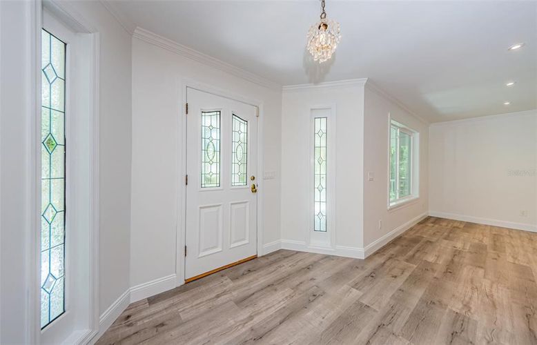 Chandelier, Empty room, Interior, Recessed Lighting, Wood Texture Flooring