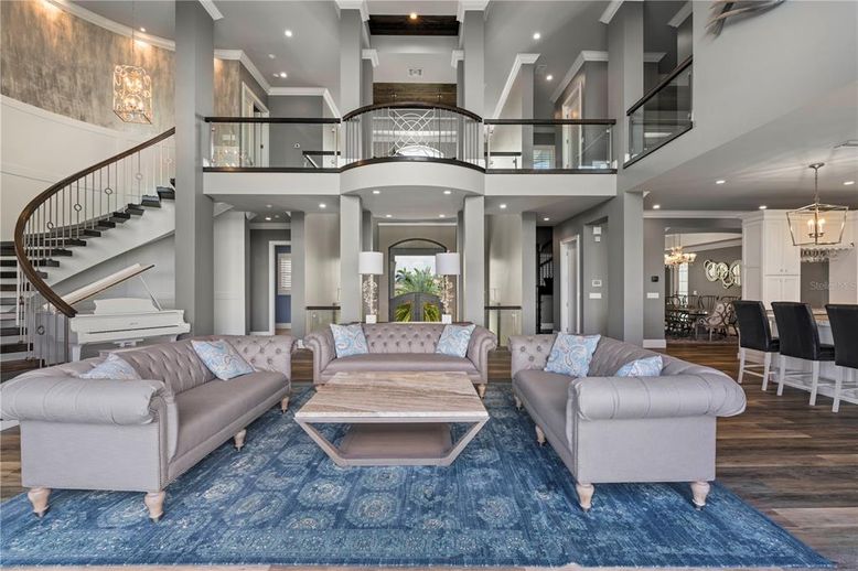 Chandelier, Dining room, Interior, Living room, Pendant Lights, Piano, Recessed Lighting, Wood Texture Flooring