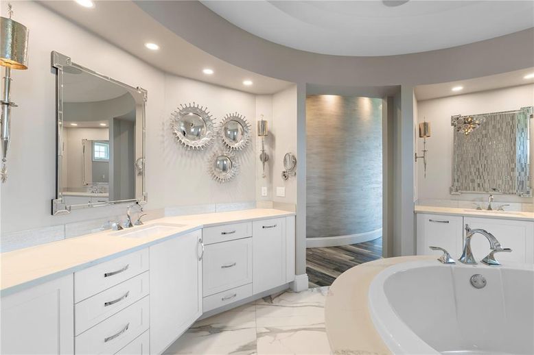 Bathroom, Dual Sink Vanities, Interior, Marble, Recessed Lighting, Wood Texture Flooring