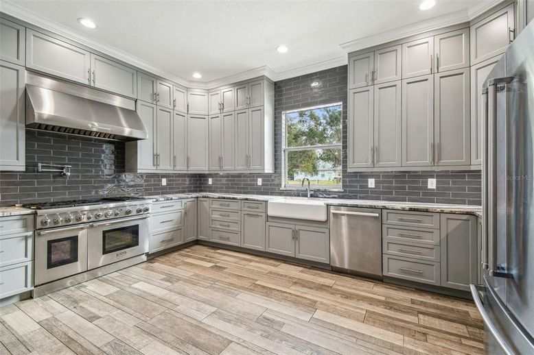 Interior, Kitchen, Recessed Lighting, Stainless Steel Appliances, Wood Texture Flooring