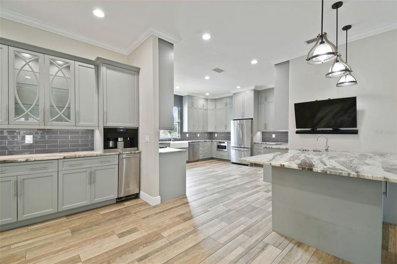 Interior, Kitchen, Pendant Lights, Recessed Lighting, Stainless Steel Appliances, Wood Texture Flooring