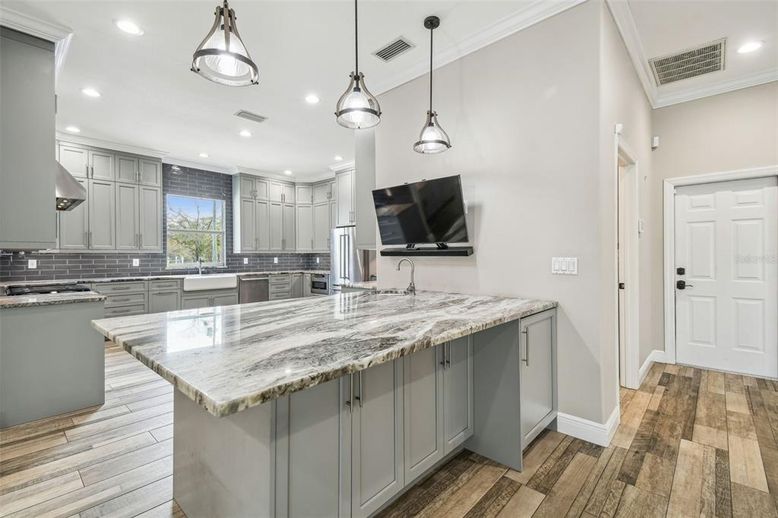 Interior, Kitchen, Pendant Lights, Recessed Lighting, Stainless Steel Appliances, Wood Texture Flooring