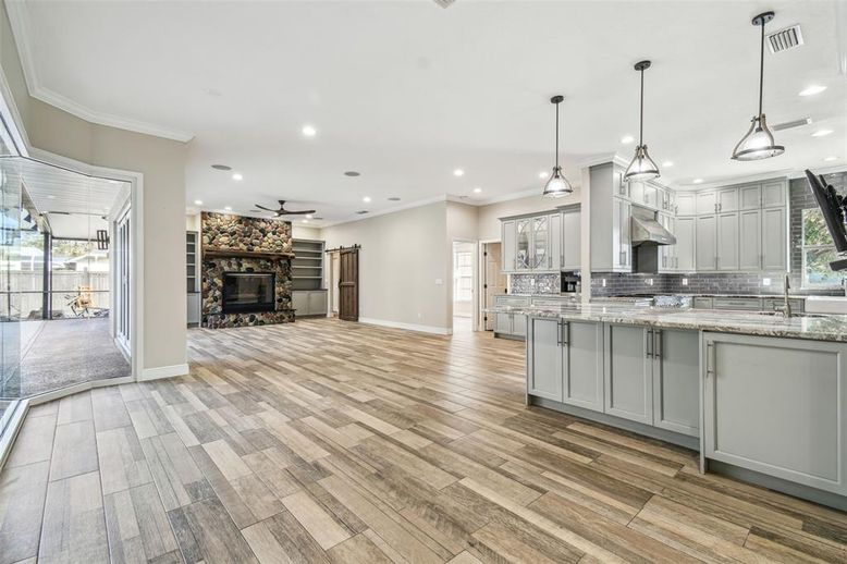 Fireplace, Interior, Kitchen, Pendant Lights, Recessed Lighting, Wood Texture Flooring