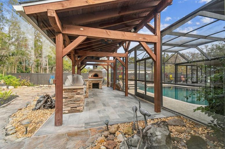Exterior, Fireplace, Glass Ceilings, Pool, Sun Room