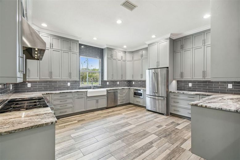 Interior, Kitchen, Recessed Lighting, Stainless Steel Appliances, Wood Texture Flooring