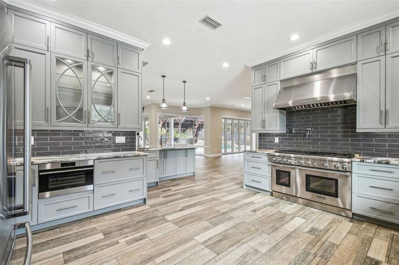 Interior, Kitchen, Pendant Lights, Recessed Lighting, Stainless Steel Appliances, Wood Texture Flooring