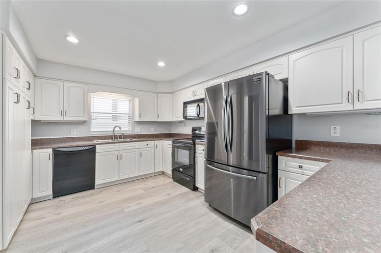 Interior, Kitchen, Recessed Lighting, Stainless Steel Appliances, Wood Texture Flooring