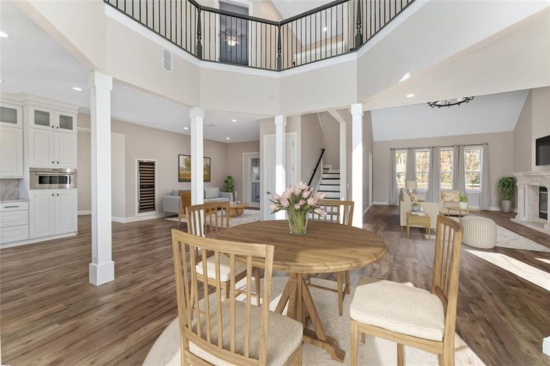 Dining room, Fireplace, Interior, Kitchen, Recessed Lighting, Wood Texture Flooring