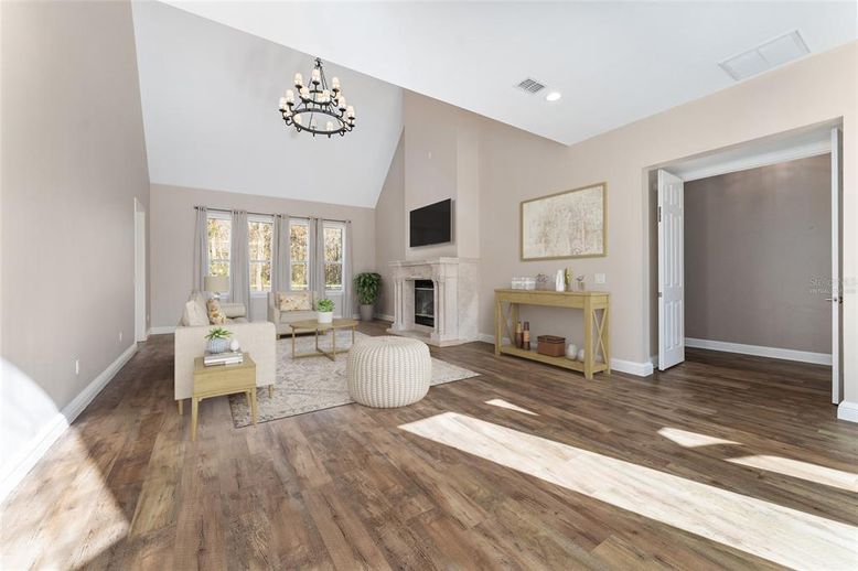 Chandelier, Fireplace, Interior, Living room, Recessed Lighting, Wood Texture Flooring