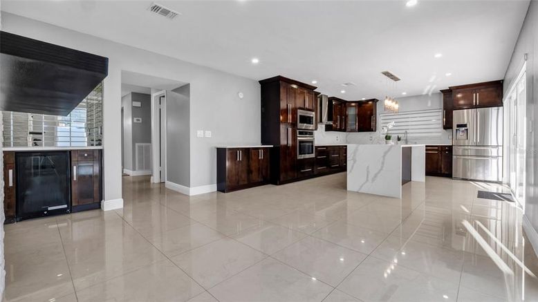Interior, Kitchen, Marble Walls, Recessed Lighting, Stainless Steel Appliances