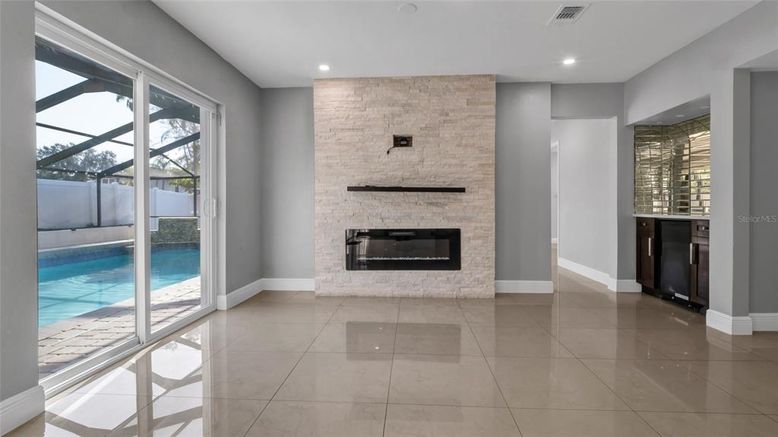 Fireplace, Interior, Pool, Recessed Lighting, Stone Walls