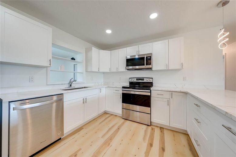Interior, Kitchen, Pendant Lights, Recessed Lighting, Stainless Steel Appliances, Wood Texture Flooring