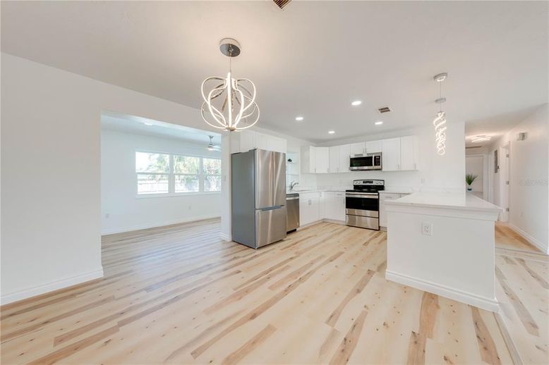Interior, Kitchen, Pendant Lights, Recessed Lighting, Stainless Steel Appliances, Wood Texture Flooring