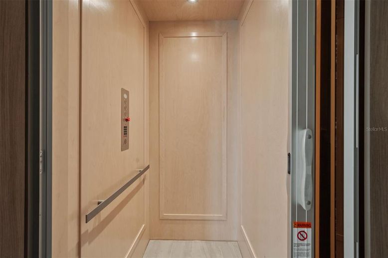 Elevator, Interior, Recessed Lighting, Wood Texture Flooring, Wooden Walls