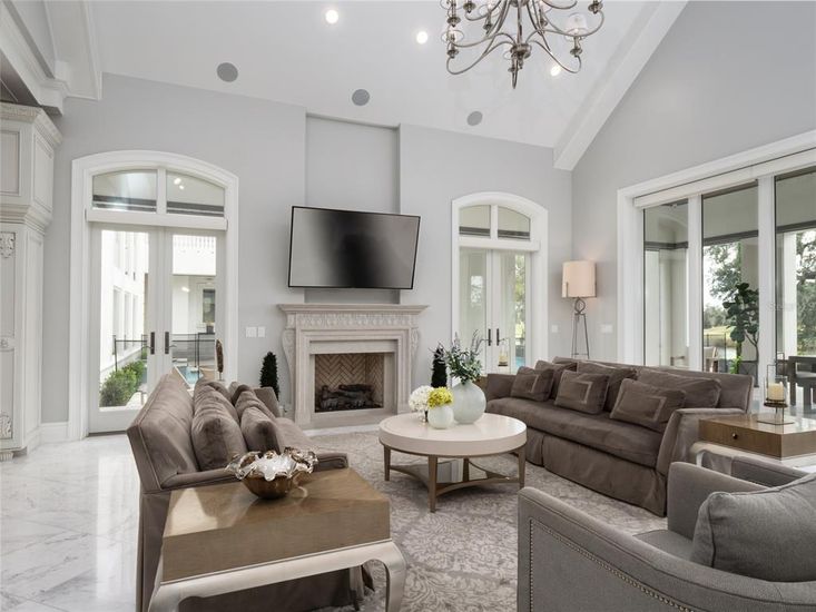 Chandelier, Fireplace, Interior, Living room, Marble, Recessed Lighting