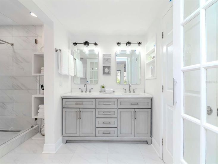 Bathroom, Dual Sink Vanities, Glass Shower, Interior, Marble, Marble Walls, Recessed Lighting