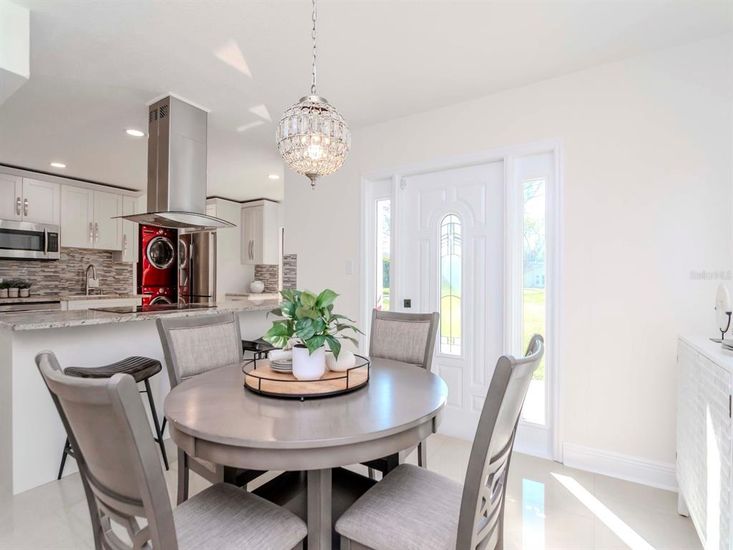 Chandelier, Dining room, Interior, Kitchen, Pendant Lights, Recessed Lighting, Stainless Steel Appliances