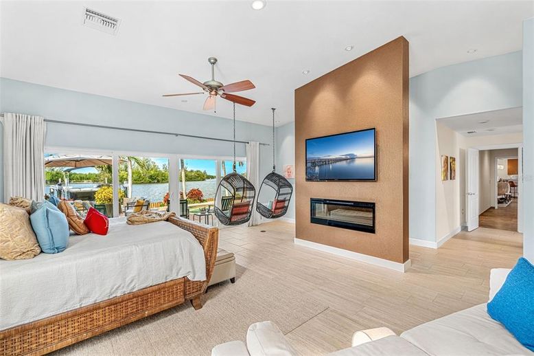 Bedroom, Fireplace, Interior, Recessed Lighting, Water, Wood Texture Flooring