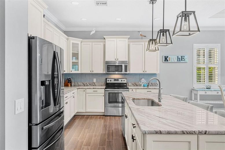 Interior, Kitchen, Pendant Lights, Recessed Lighting, Stainless Steel Appliances, Wood Texture Flooring