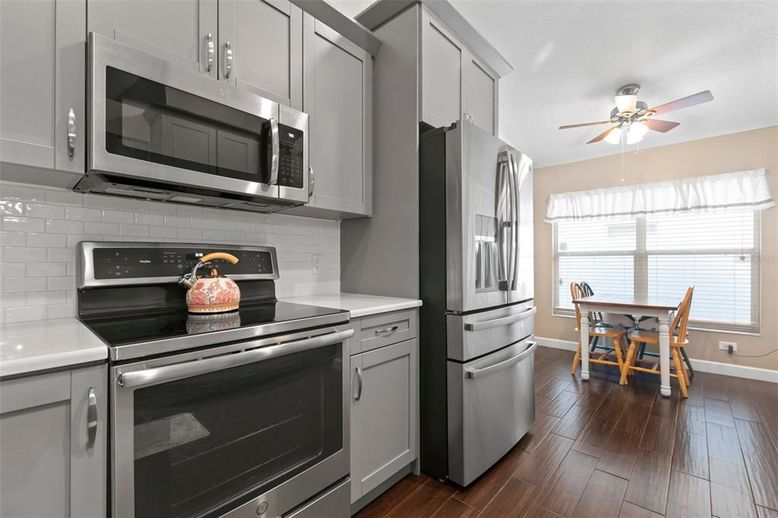 Dining room, Interior, Kitchen, Stainless Steel Appliances, Wood Texture Flooring