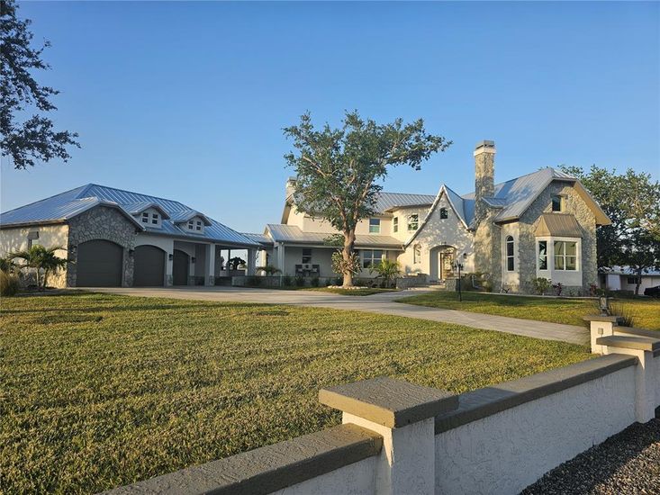 Attached, Backyard, Exterior, Facade, Solar Panels, French Provincial