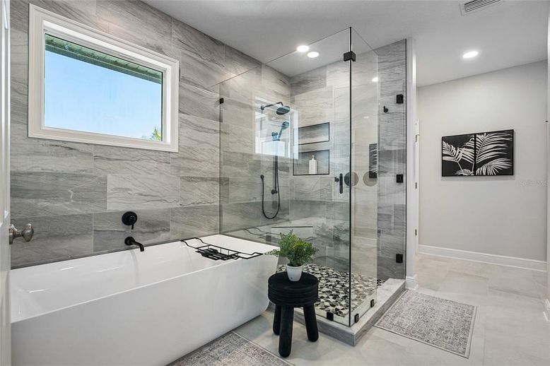 Bathroom, Free Standing Baths, Glass Shower, Interior, Marble Walls, Recessed Lighting