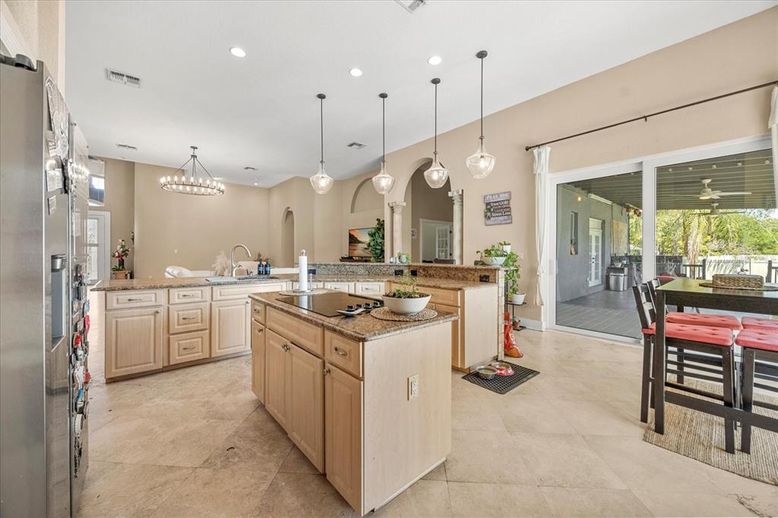 Chandelier, Dining room, Interior, Kitchen, Pendant Lights, Recessed Lighting, Stainless Steel Appliances