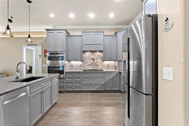 Interior, Kitchen, Pendant Lights, Recessed Lighting, Stainless Steel Appliances, Wood Texture Flooring