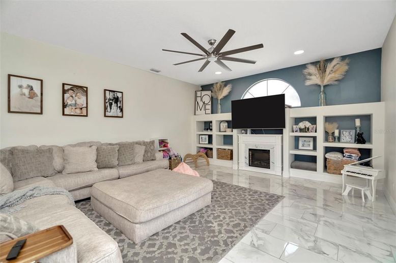 Fireplace, Interior, Living room, Marble, Piano, Recessed Lighting