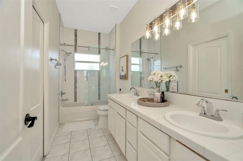 Bathroom, Dual Sink Vanities, Glass Shower, Interior, Tile Countertops