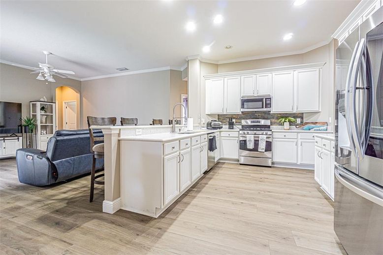 Interior, Kitchen, Recessed Lighting, Stainless Steel Appliances, Wood Texture Flooring